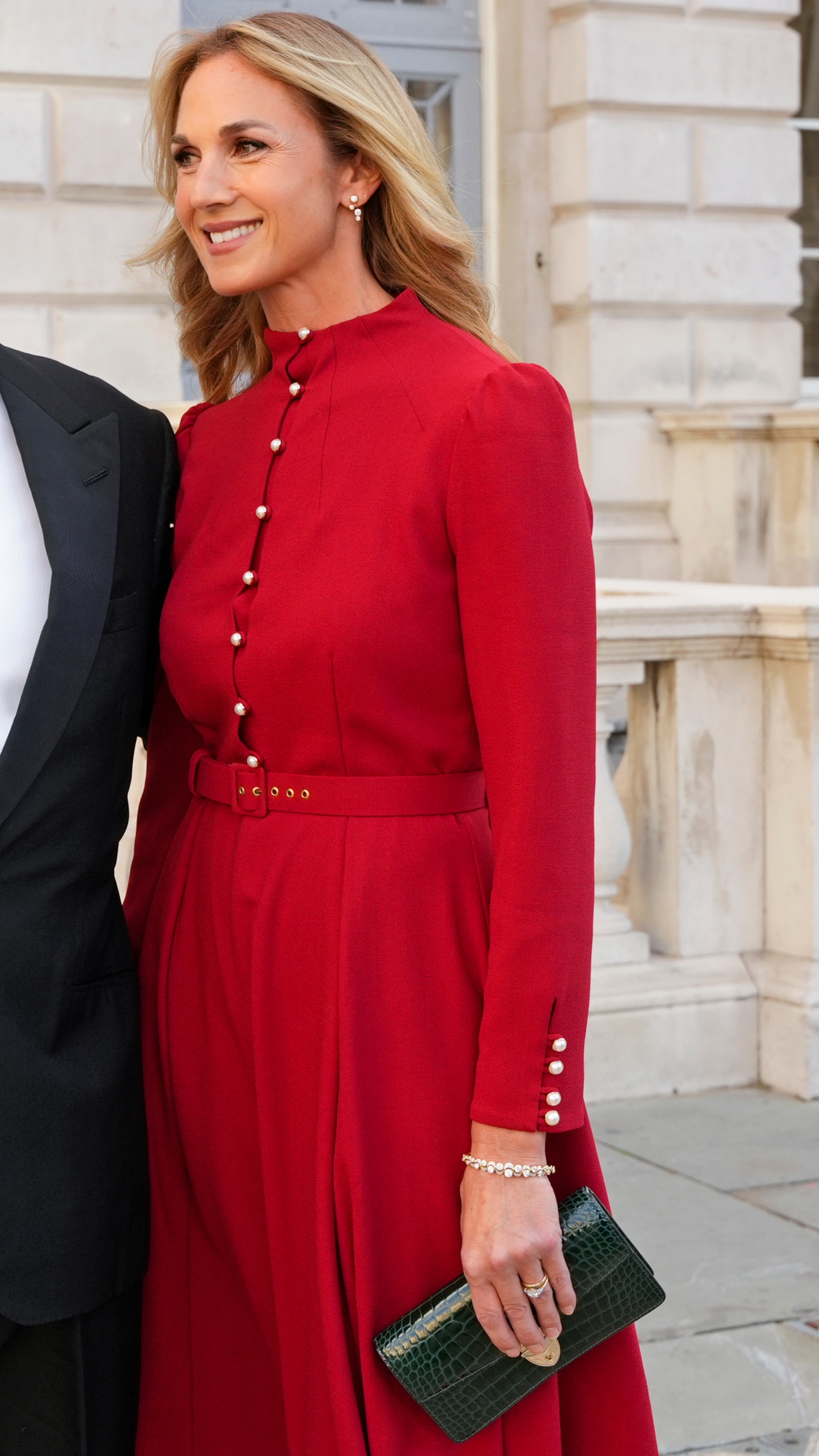Harriet Phillips looks to the side as he attends the opening ceremony and reception for "Reviving Craft: Reflection of the Mind"