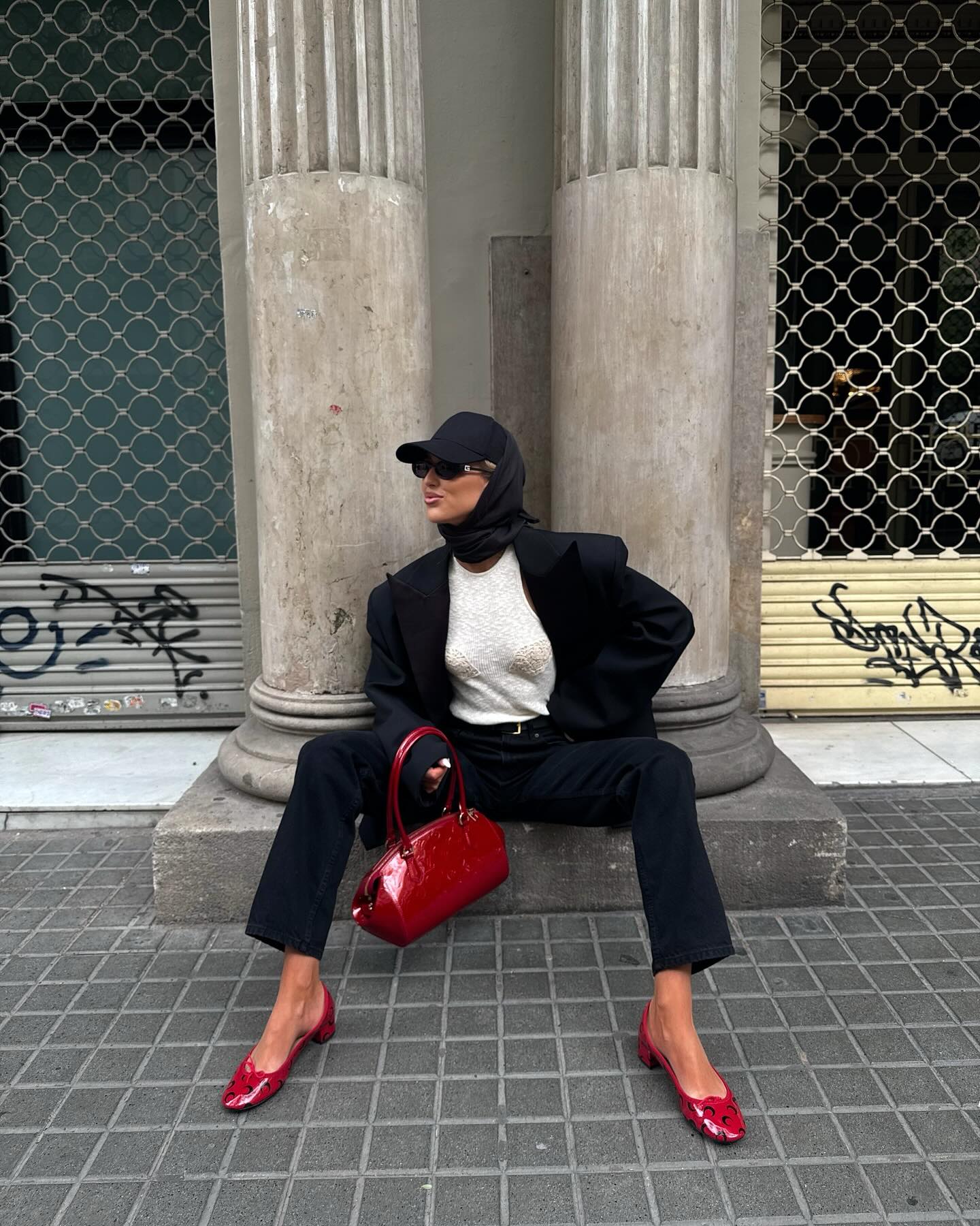 Woman in red kitten-heel pumps