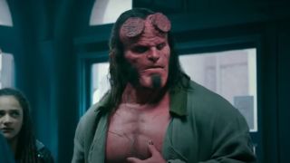 David Harbour with a quizzical look on his face in the 2019 movie Hellboy