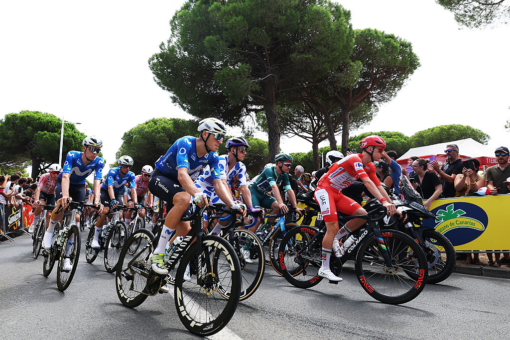 GRUISSAN - AUDE, FRANCE - AUGUST 24: A general view of Pablo Castrillo of Spain and Movistar Team and Tadej Pogacar of Slovenia and UAE Team Emirates XRG - Red Leader Jersey and the peloton competing prior to the La Vuelta - 81st Tour of Spain 2026, Stage 3 a 174km from Gruissan - Aude to Font Romeu 1941m / #UCIWT / on August 24, 2026 in Gruissan - Aude, France. (Photo by Alexander Hassenstein/Getty Images)