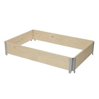 Rectangular raised bed made from wood with metal corners on a white background