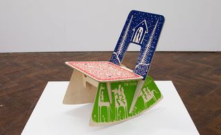 rocking chair model in red, blue and green patterns