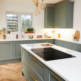 Greg Rutherford's kitchen with green cabinets