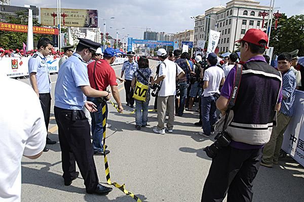 There was chaos for tour photographers at the finish in Wuzhishan with police moving the photo-box tape several times as the peloton neared the finish.