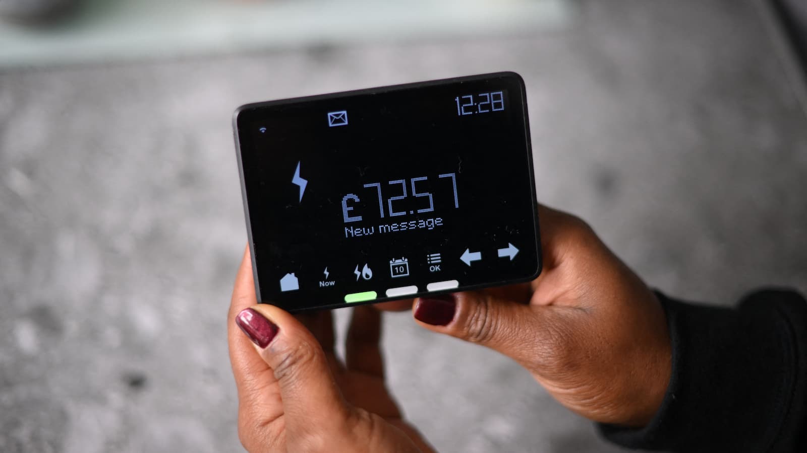 A smart meter indicating remaining credit balance, in pounds sterling, in a house in London