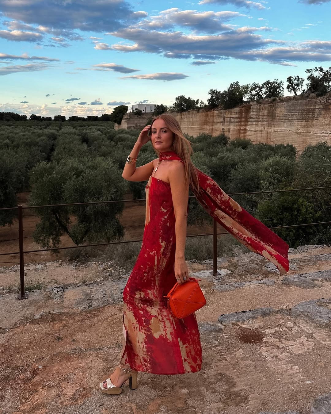 Rebecca in a red scarf dress