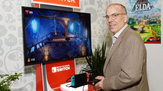 Doug Bowser checking out Luigi's Mansion 3 on the Nintendo Switch during 2019 E3 Gaming Convention.