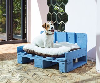 painted dog bed made from pallets
