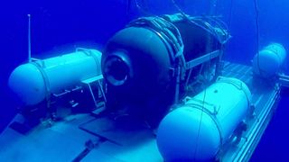 The missing titan submersible on its launch platform underwater