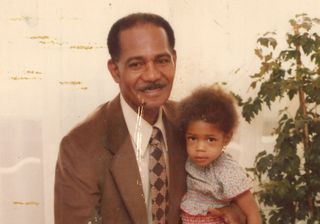 Naomie Harris as a child with her grandfather Josceyln