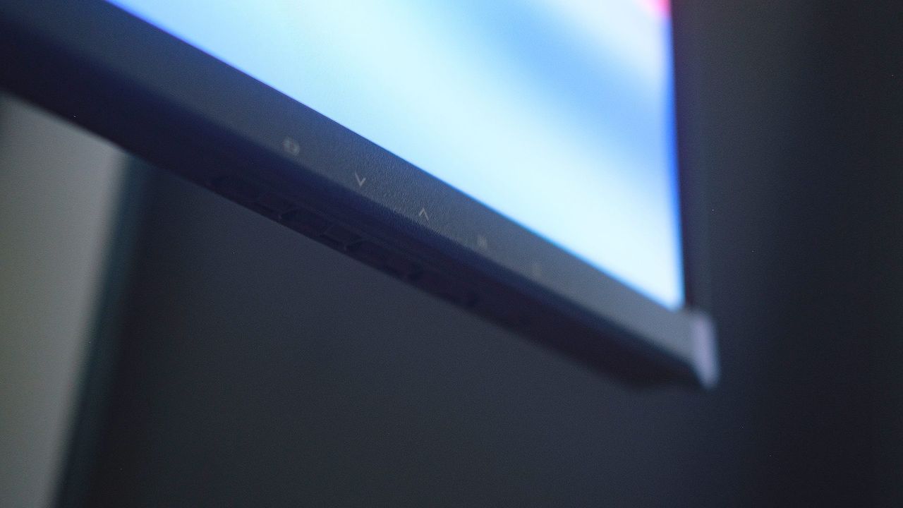 Close up of AOC GAMING Q27G4ZD monitor OSD buttons