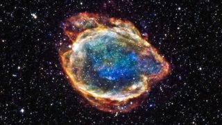 A brightly colored supernova against a backdrop of stars