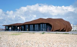 Thomas Heatherwick's East Beach Cafe in Littlehampton, UK is influenced by eroded seaside objects and the texture of British shingle coastlines