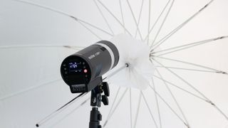 Godox Ad300Pro in front of a white umbrella
