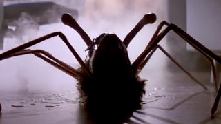 An alien spider crawling towards the camera in the movie, The Thing.