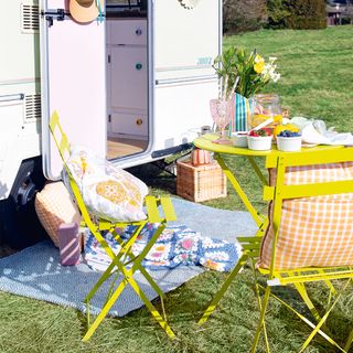 Caravan makeover with outdoor area and folding chairs