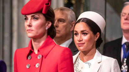 Catherine, The Duchess of Cambridge stands with Meghan, Duchess of Sussex at Westminster Abbey for a Commonwealth day service on March 11, 2019 in London, England