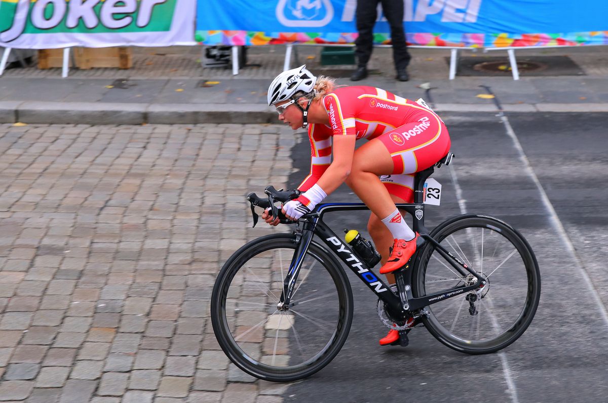 Emma Cecilie Norsgaard Jorgensen (Denmark) riding to silver