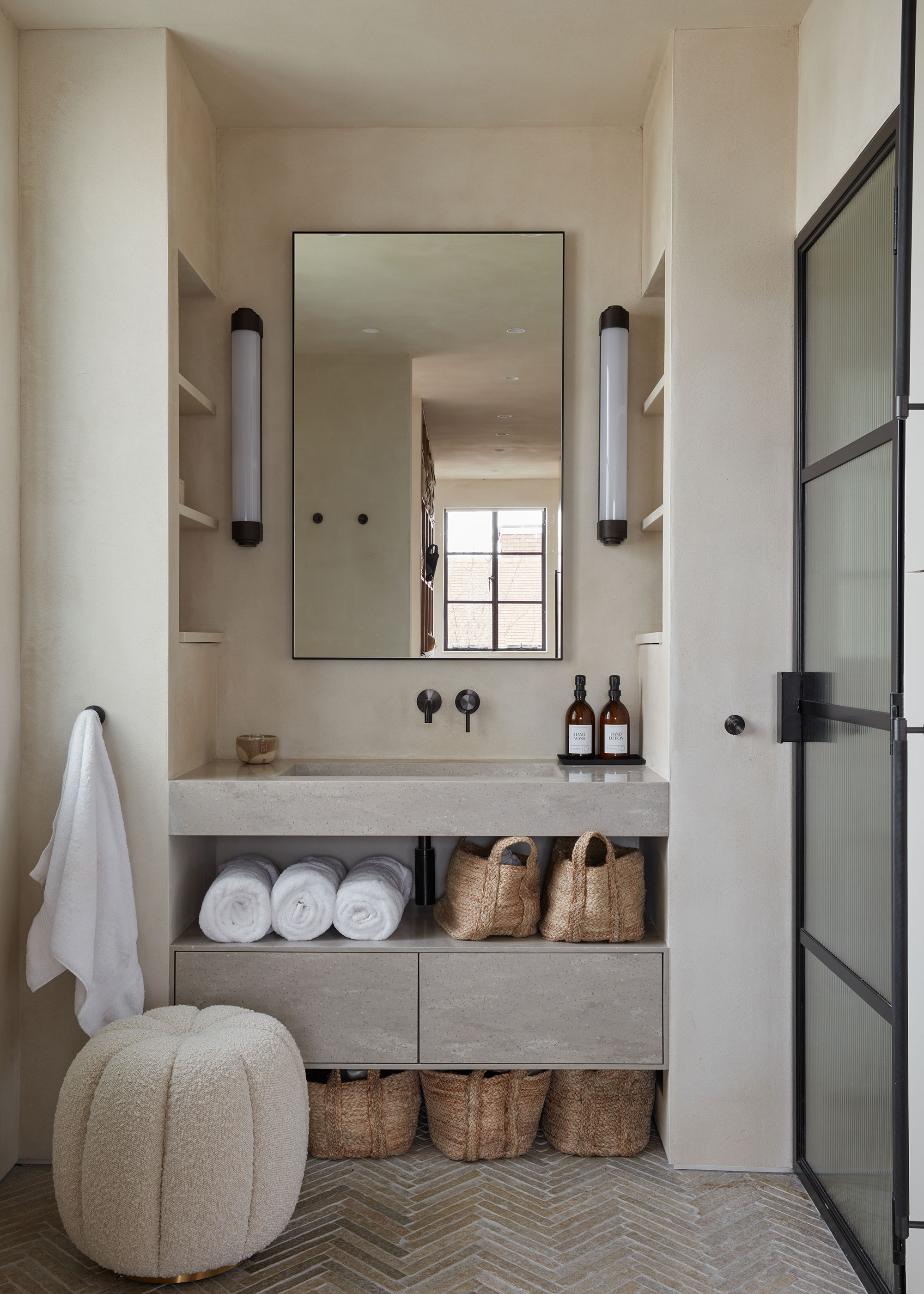 modern shower room with herringbone flooring