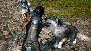 Promotional screenshot of Clive playing with Torgal in Final Fantasy 16