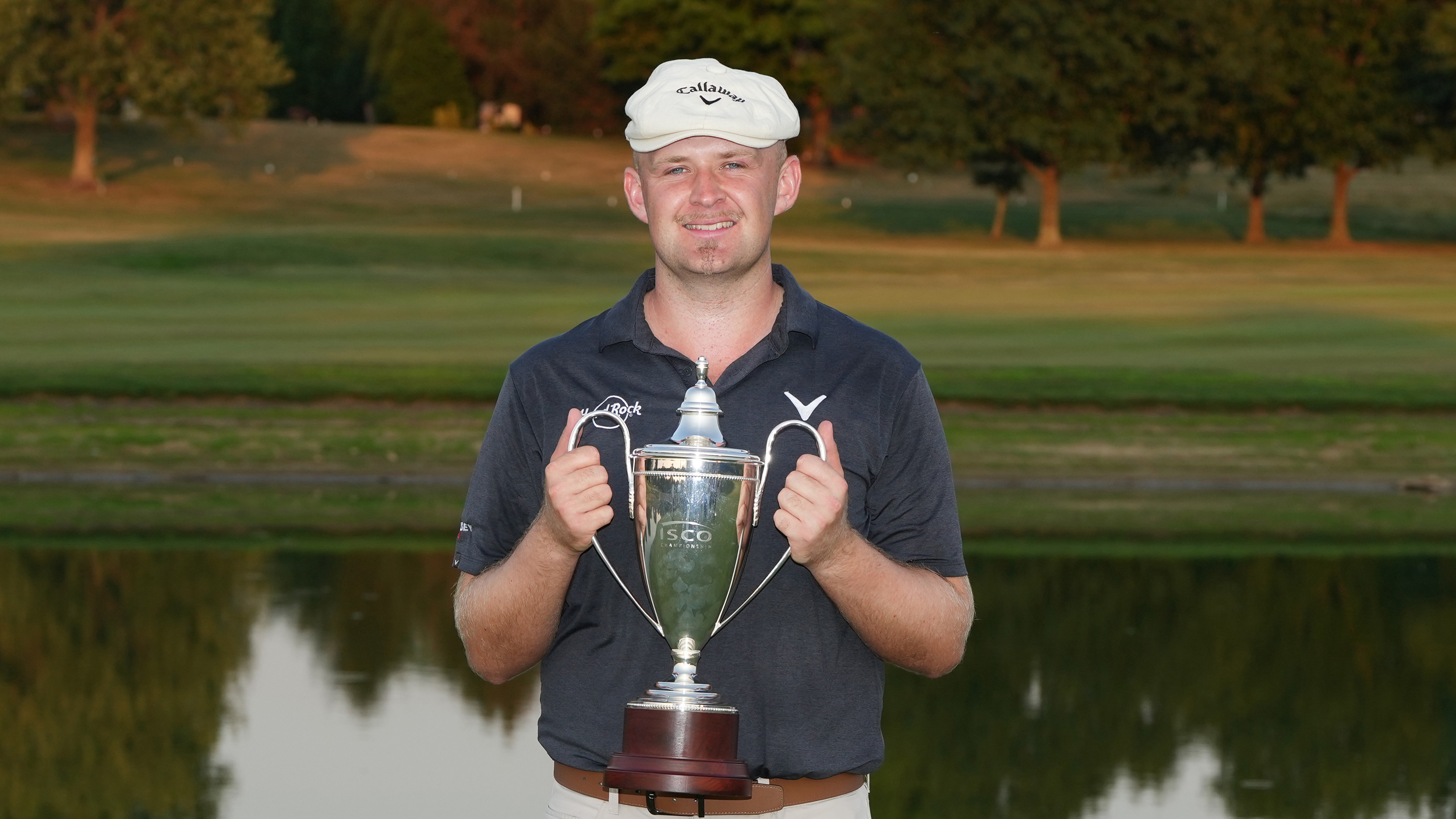 Harry Hall holds up the ISCO Championship trophy after winning in 2024