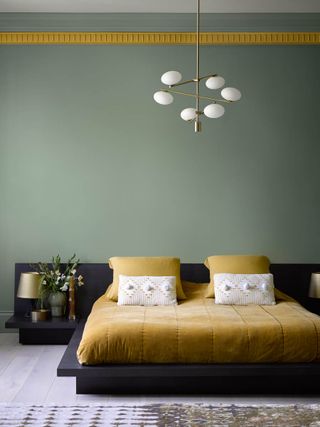 green bedroom in Benjamin Moore Scenic Drive