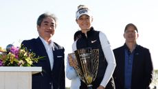 Nelly Korda of the United States poses with the winner’s trophy after winning the Mizuho Americas Open at Liberty National Golf Club on May 19, 2024 in Jersey City, New Jersey.