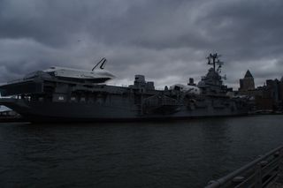 The Enterprise on the deck of the Intrepid.