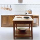 wooden table with copper utensil and white tile