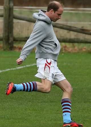 Prince William playing football