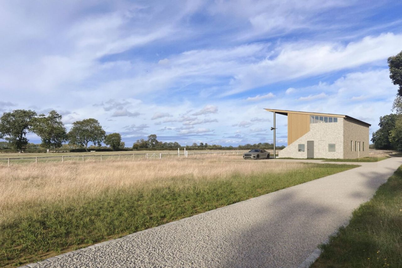 The planned designs for the house of a converted horse racing stand shows a white brick structure with a timber frame