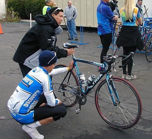 Mike Creed's bike gets some last minute adjustments