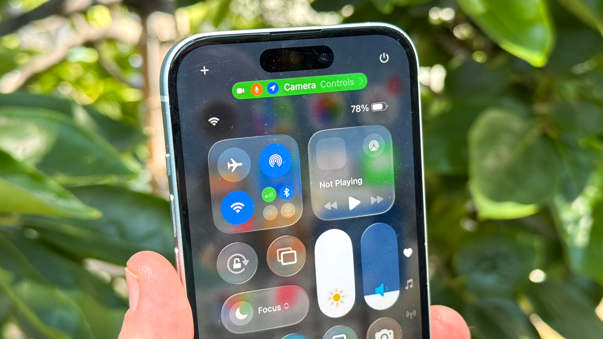 liquid glass control panel in iOS 26
