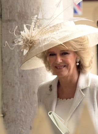 The now Queen Consort wore the Prince of Wales feathers brooch on her wedding day to Charles