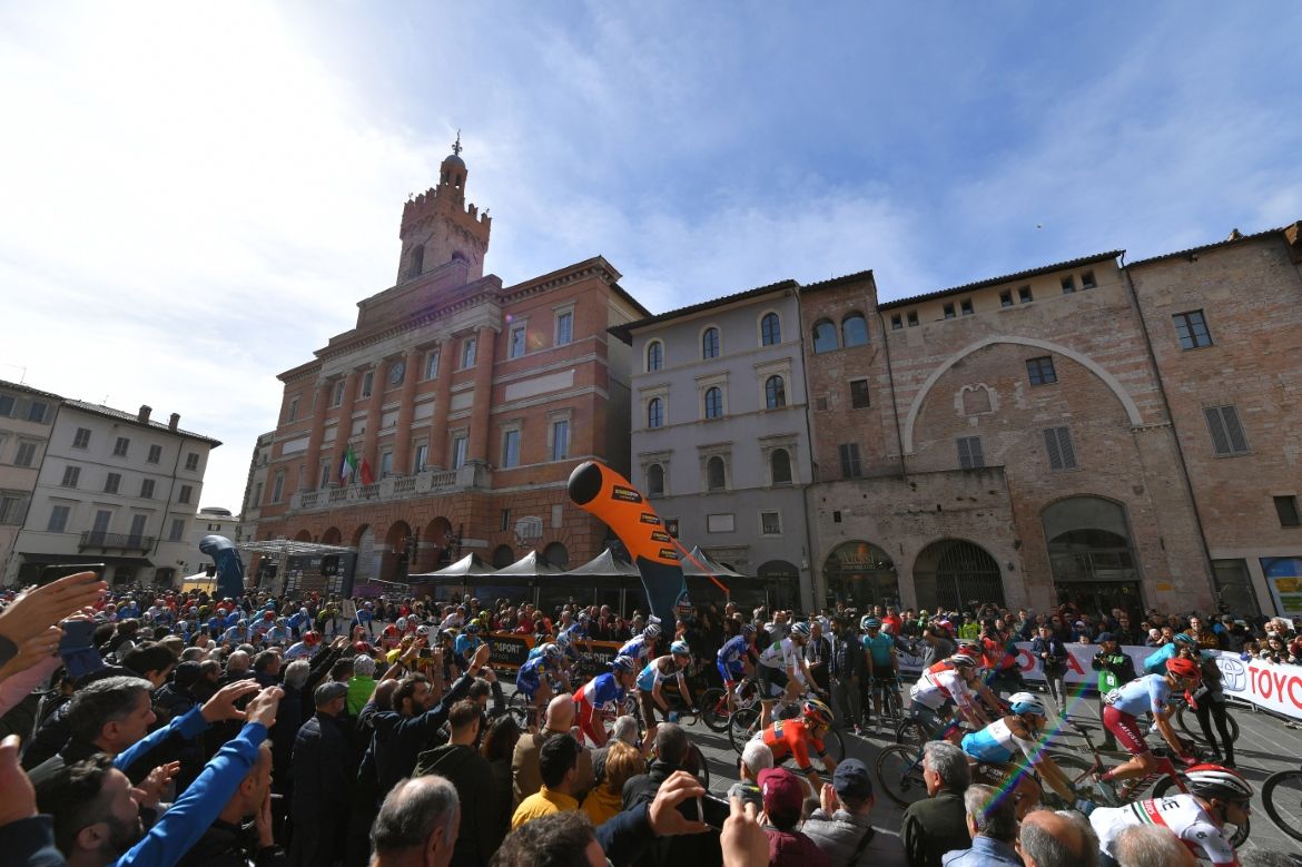 The riders line-up for the start