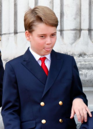 Prince George sticking his tongue out
