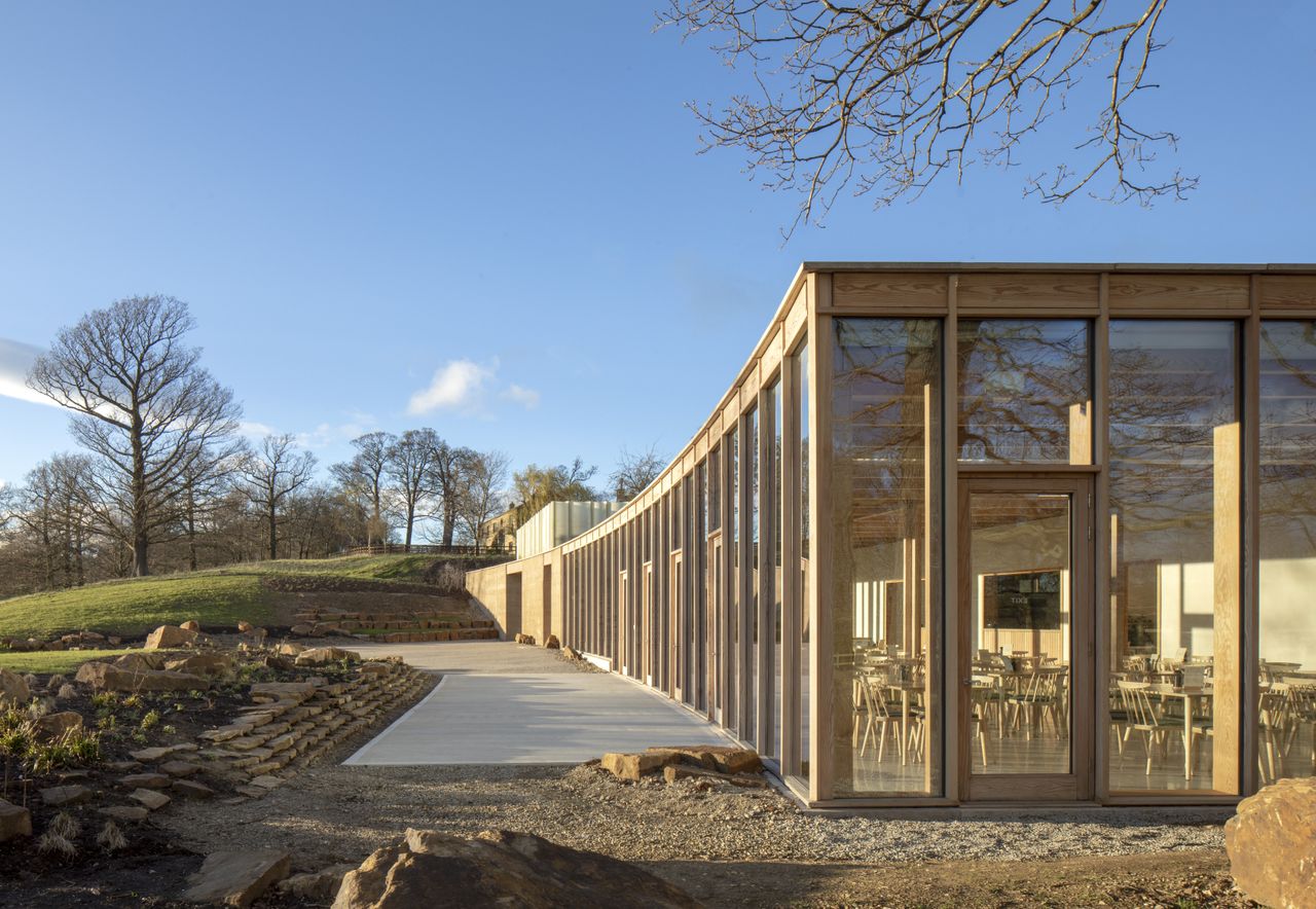 The long rectangular structure to the centre has floor to ceiling windows. 