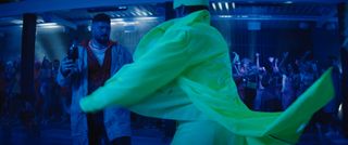 Making the VFX of The Fall Guy; a man in a rain coat in a nightclub