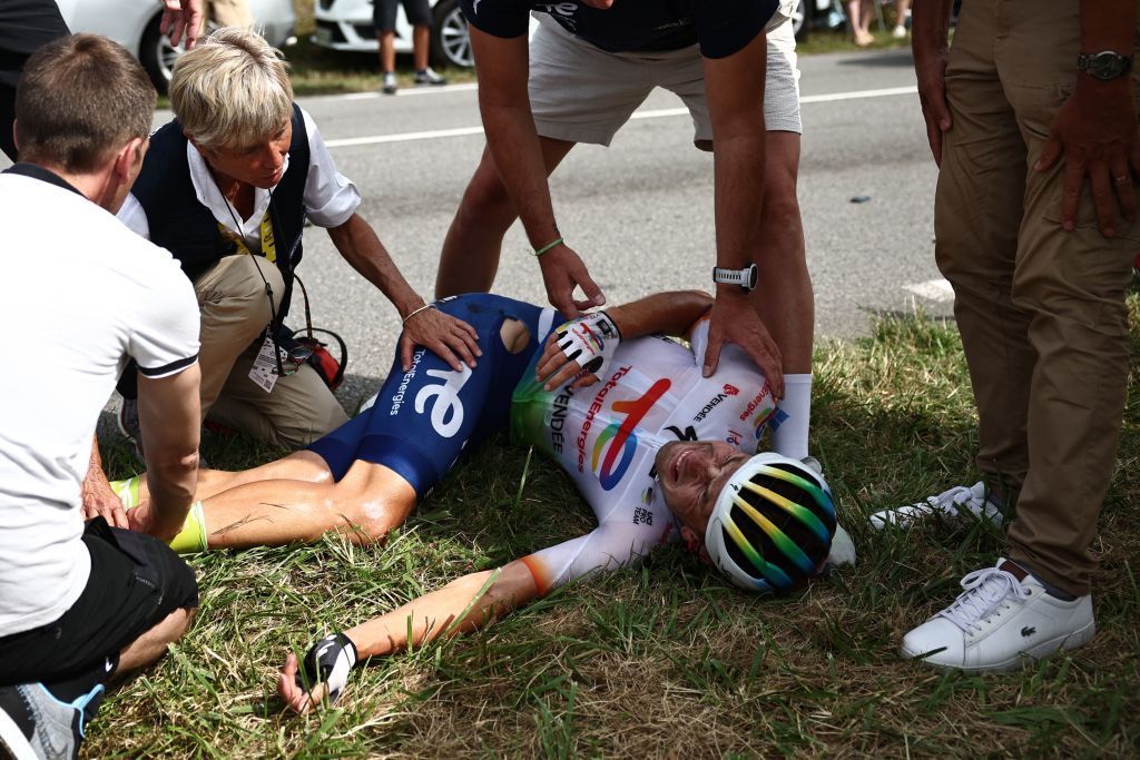 TotalEnergies Belgian rider Steff Cras C reacts on the ground after a crash during the 8th stage of the 110th edition of the Tour de France cycling race 201 km between Libourne and Limoges in central western France on July 8 2023 Photo by AnneChristine POUJOULAT AFP Photo by ANNECHRISTINE POUJOULATAFP via Getty Images