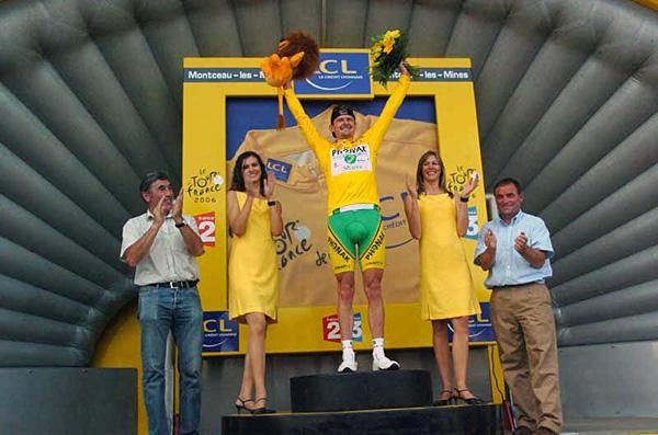 Floyd Landis (Phonak) on the podium with Eddy Merckx and Bernard Hinault