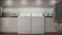 Washer and dryer set sat side by side in home