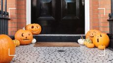 picture of carved pumpkins outside front door 