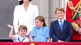 Prince George, Princess Charlotte and Prince Louis watch the RAF flypast on the balcony of Buckingham Palace