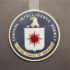 CIA badge on stand