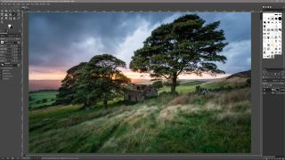 Screenshot of GIMP software editing a picture of field with large trees