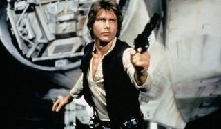 Star Wars A New Hope Harrison Ford Solo poses with a gun next to the Falcon