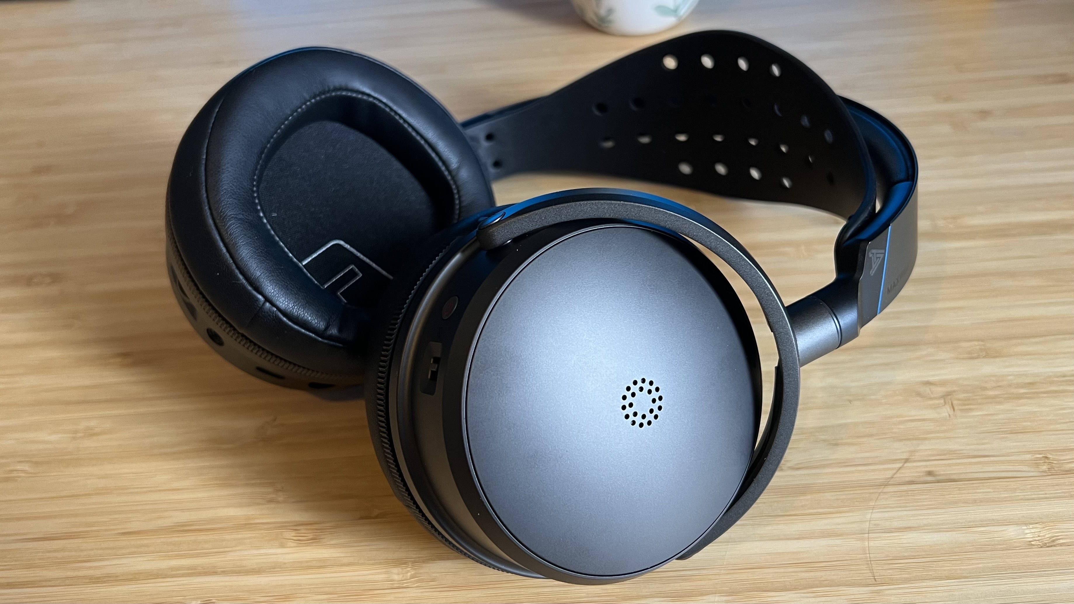 Audeze Maxwell 2 gaming headset on a wooden desk