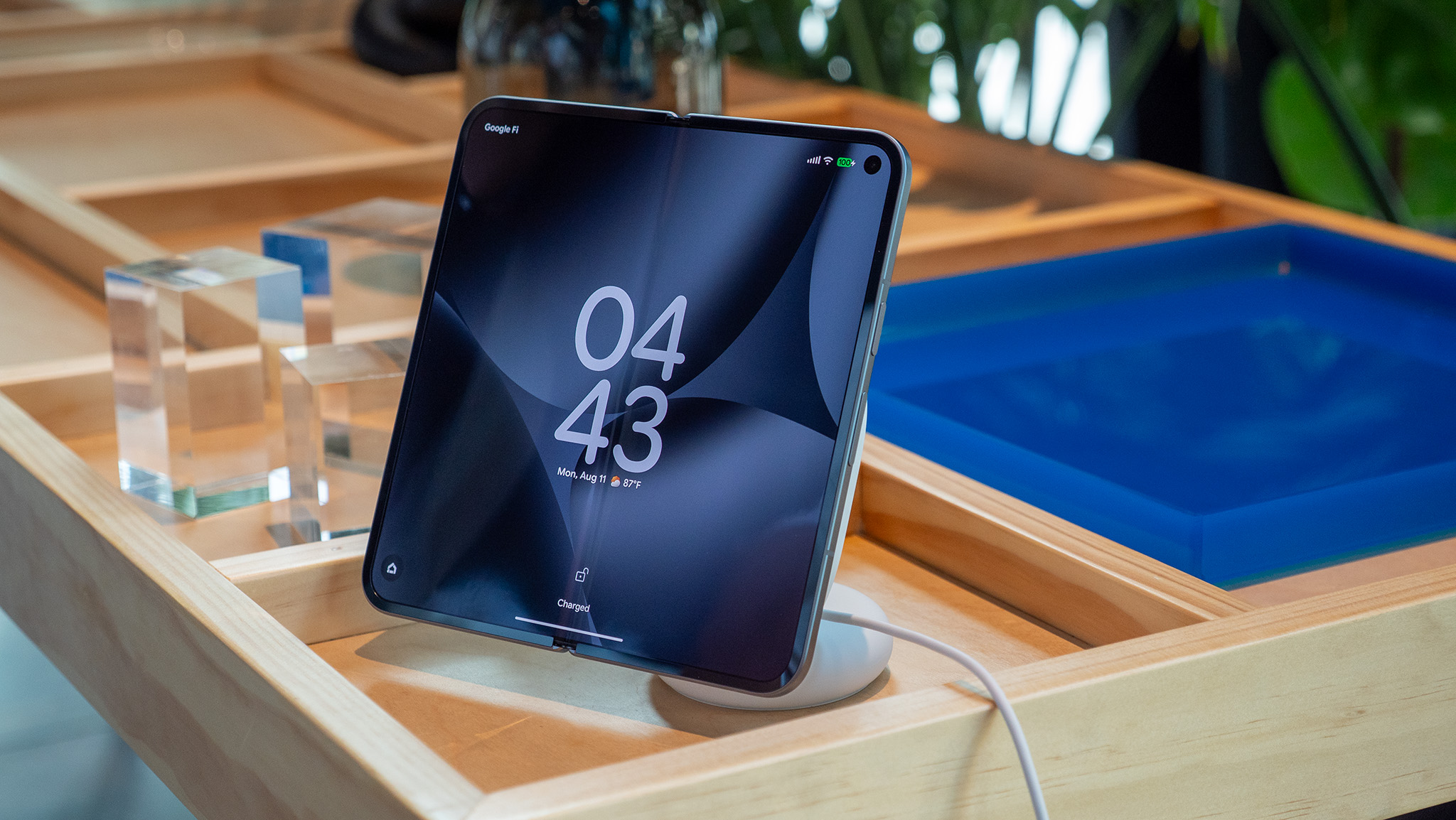 The Google Photos screensaver functionality on a Google Pixel 10 Pro Fold when docked to a Pixelsnap Charger