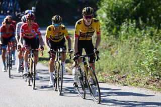 LACRUZDELINARES SPAIN SEPTEMBER 14 LR Sepp Kuss of The United States Red Leader Jersey Primo Roglic of Slovenia and Jonas Vingegaard of Denmark and Team JumboVisma compete during the 78th Tour of Spain 2023 Stage 18 a 1789km stage from Pola de Allande to La Cruz de Linares 840m UCIWT on September 14 2023 in La Cruz de Linares Spain Photo by Tim de WaeleGetty Images