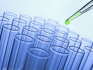 Chemistry scene of test tubes and pipette.